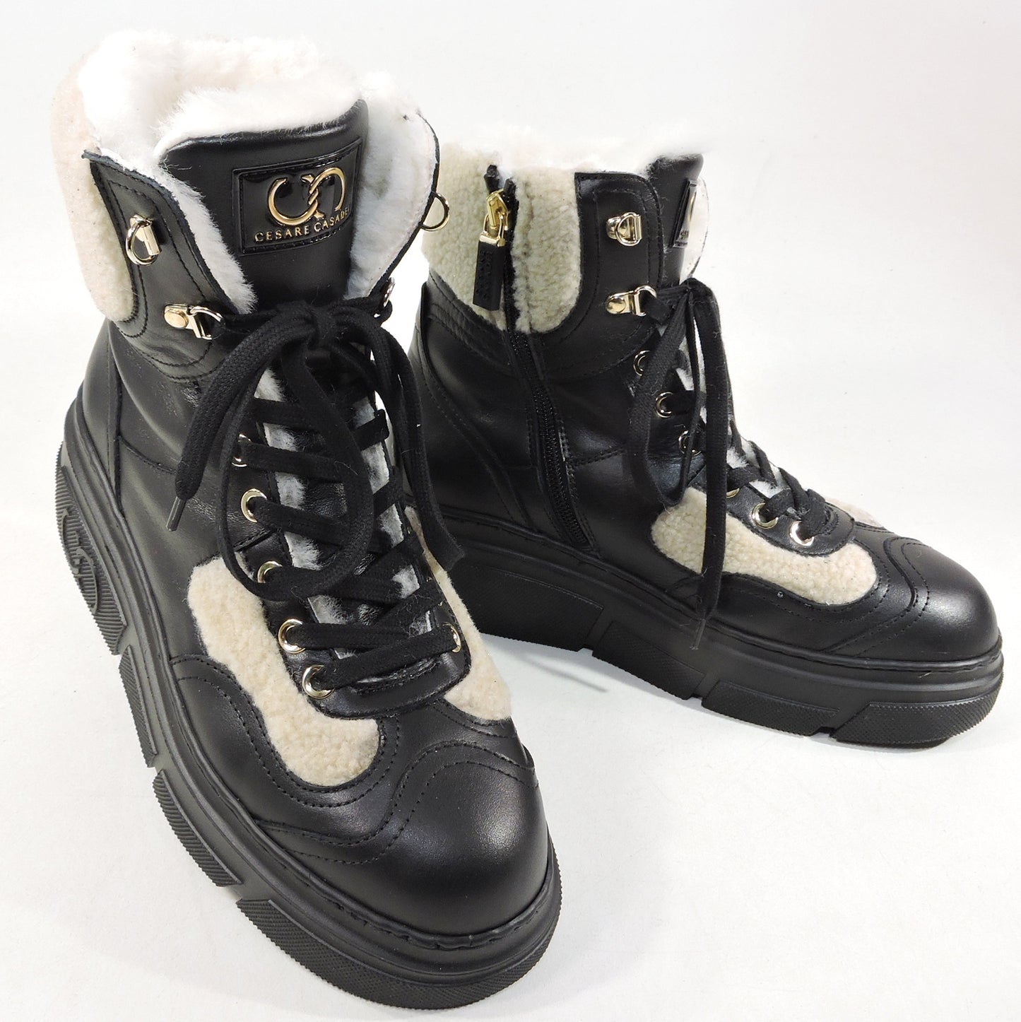 CASADEI ๐ฎ๐น WOMEN'S BLACK SOFT LEATHER WHITE MERINO FUR WINTER FASHION BOOTIE