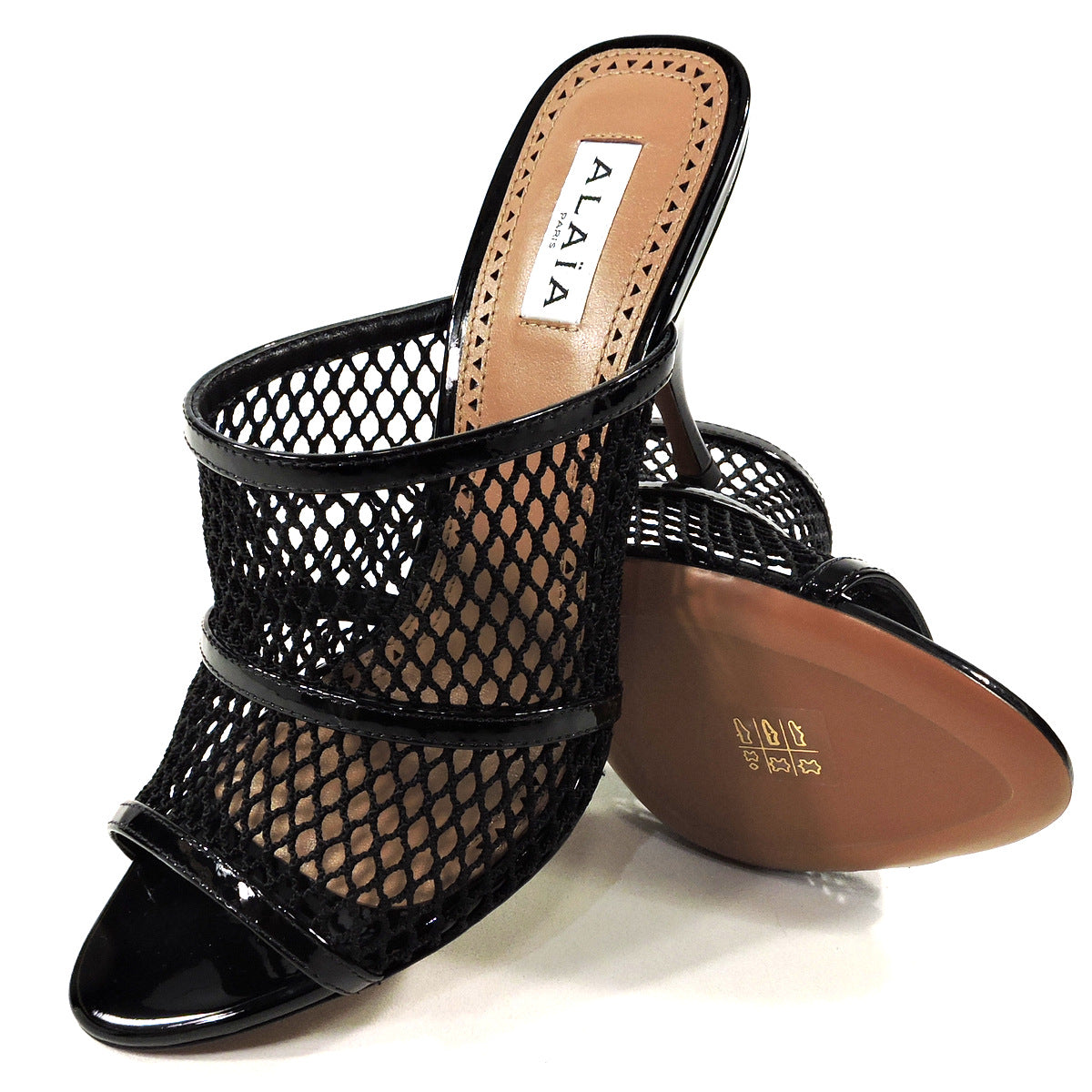 ALAIA š®š¹ WOMEN'S BLACK LEATHER AND FABRIC FASHION COMFORT MULES